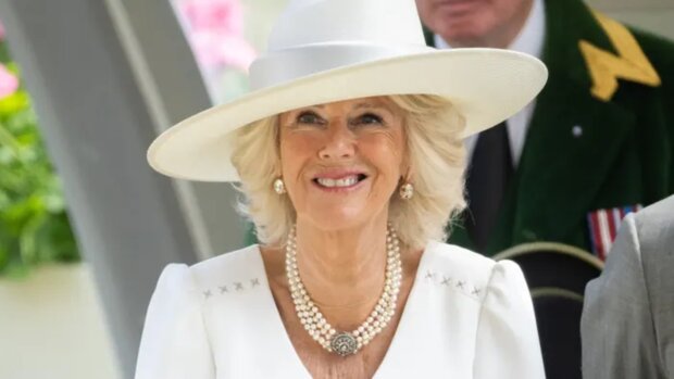 Unexpected attire. Queen Camilla opts for a stylish jumpsuit during a work visit